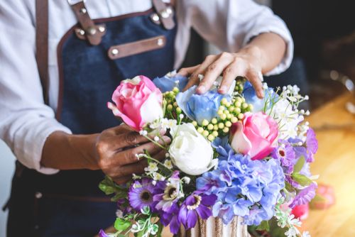 Florist Creating a Flower Arrangement