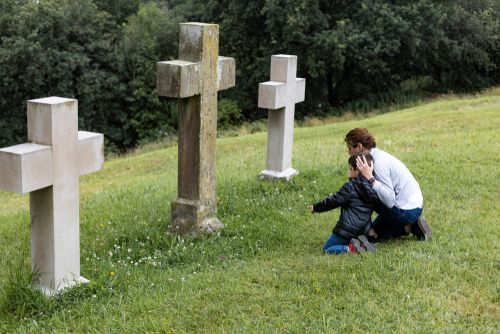 Parent and Child at a Gravesite