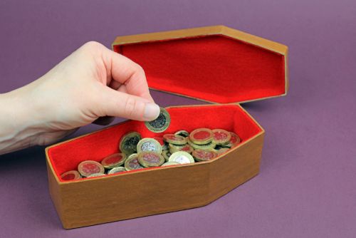 Putting Coins in a Coffin