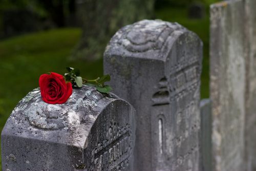 Tombstone With a Rose on Top