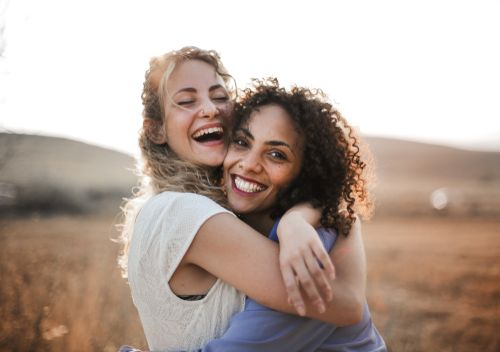 Two Friends Hugging Each Other