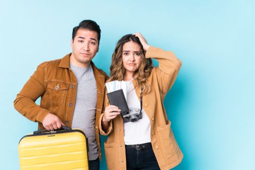 Young Couple About To Go on a Vacation