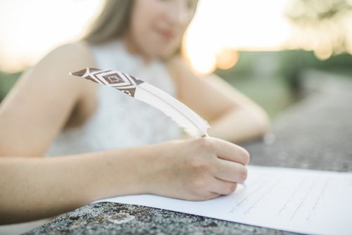 Young Woman Writing Wedding Vows