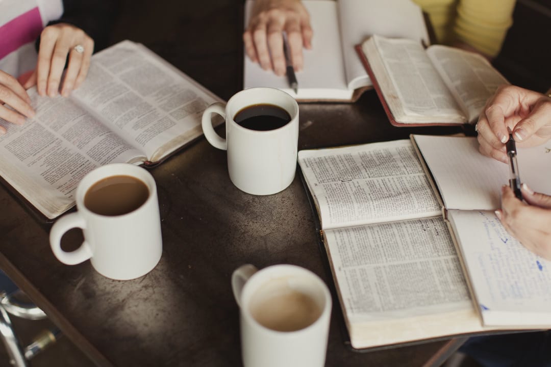 Group of friends studying religion together